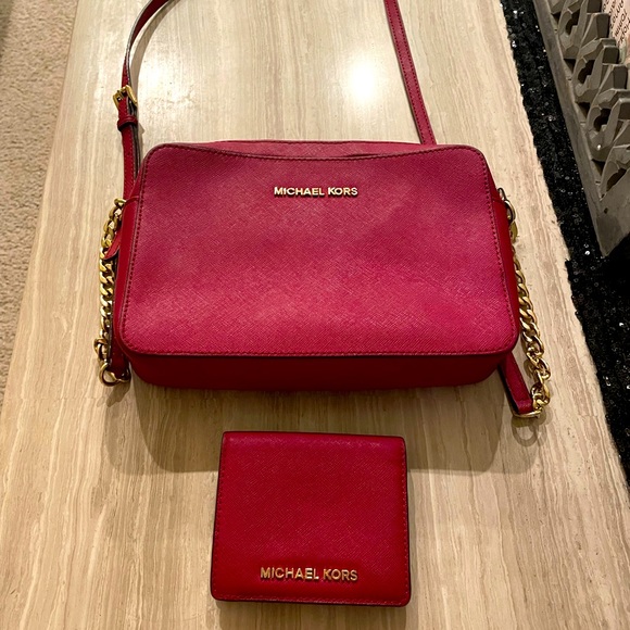 Michael Kors red purse and wallet sold as set. Slightly used. - Picture 1 of 6
